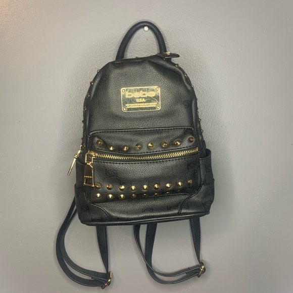 bebe Handbags - BEBE black and gold studded mini backpack